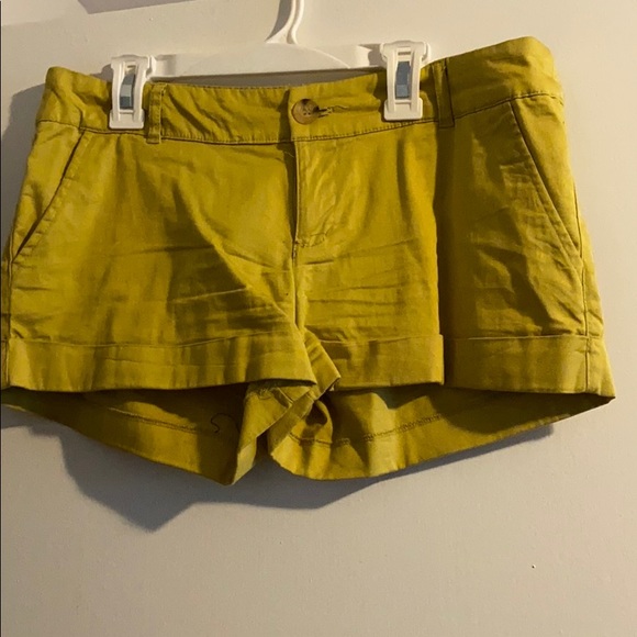 gold cargo shorts